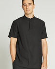 Kyle is 6'1" and wears a size L